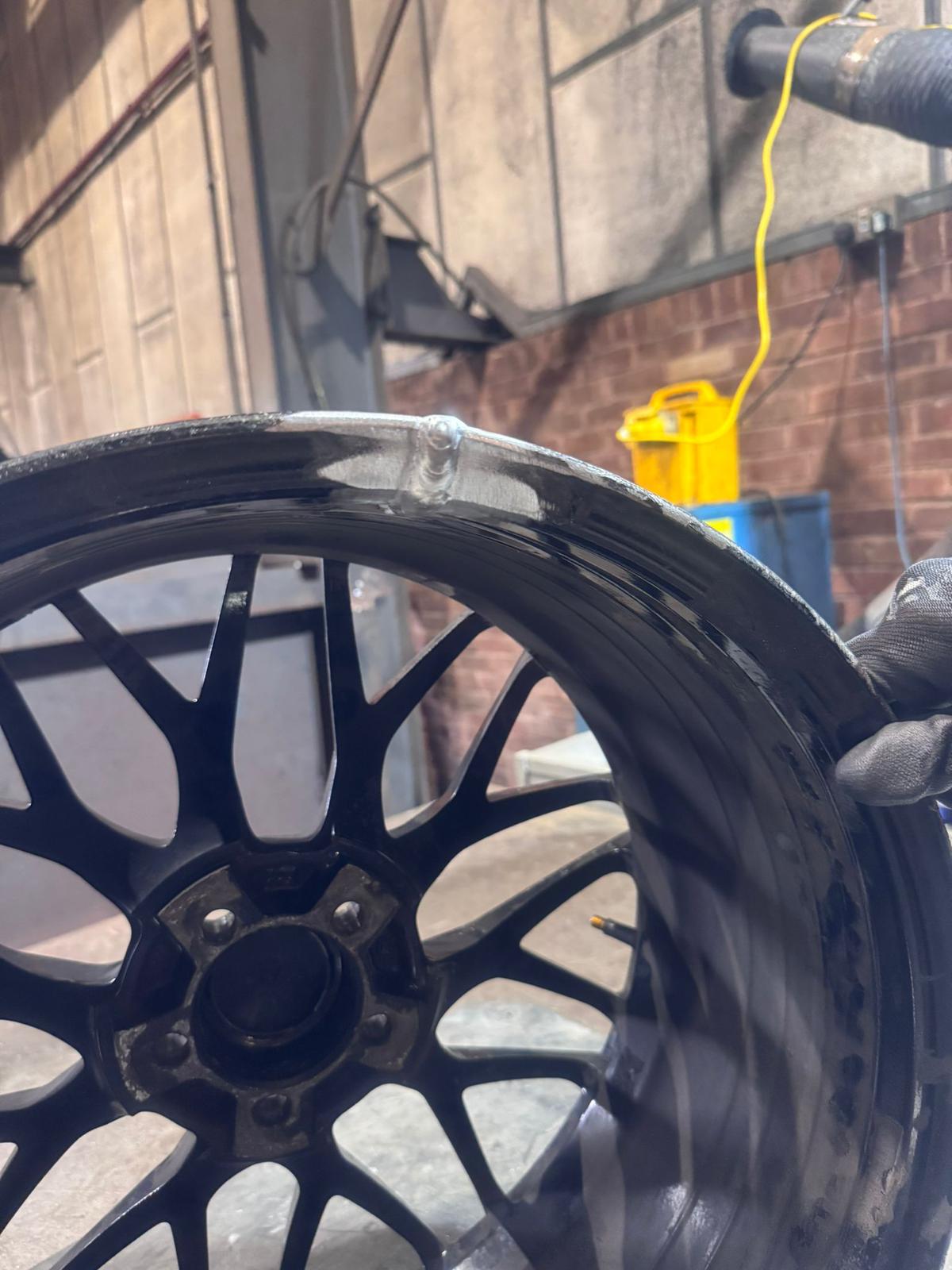 TIG welding a structural crack on an aluminium alloy wheel at Starweld Engineering, Sheffield