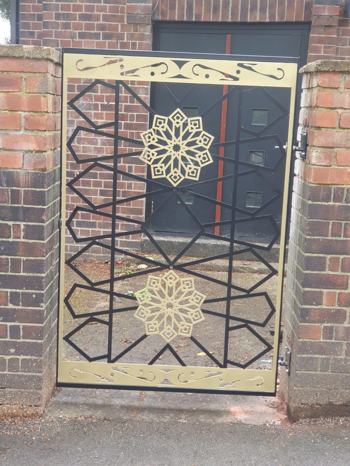 Bespoke black and gold decorative metal gate designed and installed by Starweld Engineering, Sheffield